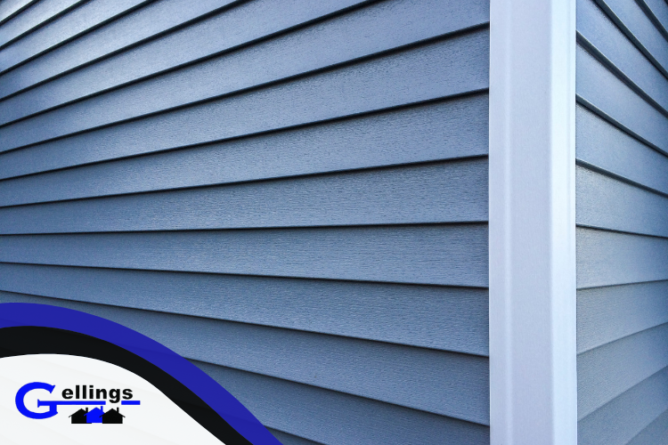 Close-up of siding inspection and maintenance by Gellings professionals.